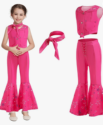 Children smiling in Halloween costumes
