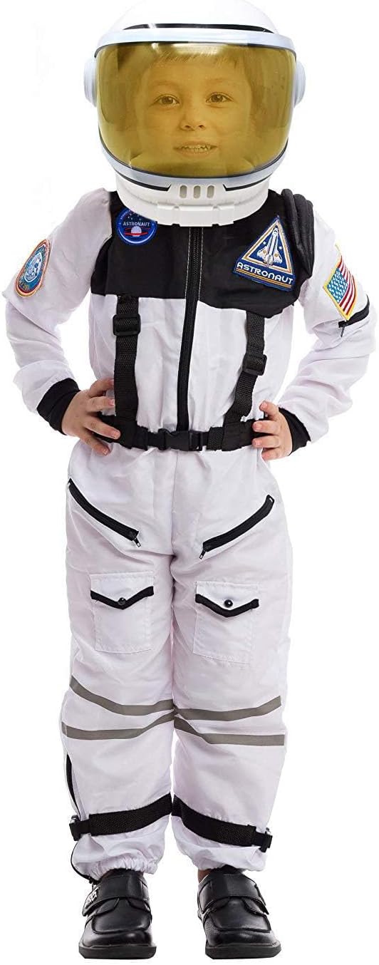 Child wearing a white astronaut suit and helmet for an astronaut and alien sibling theme