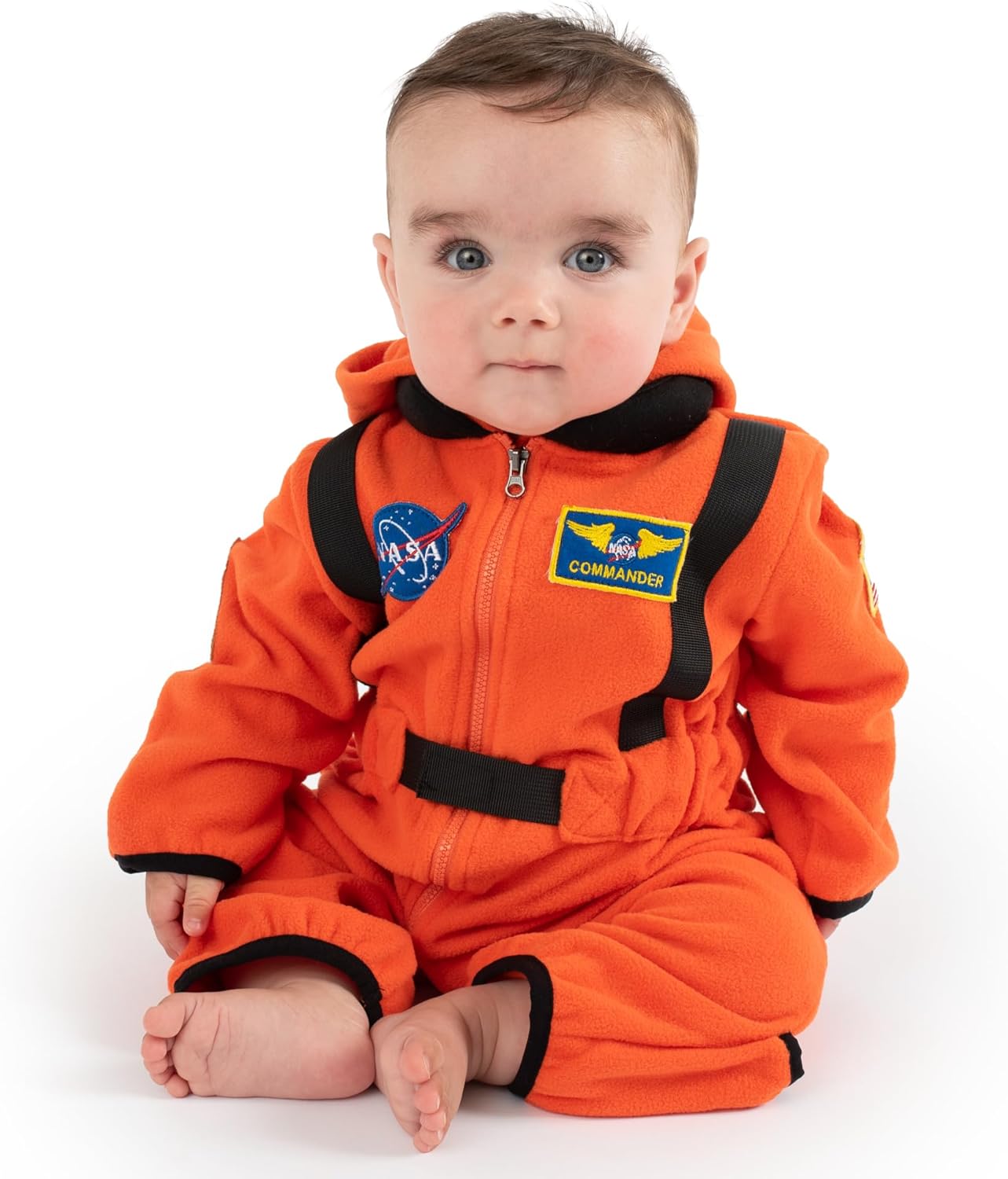 Baby wearing an orange astronaut fleece bodysuit