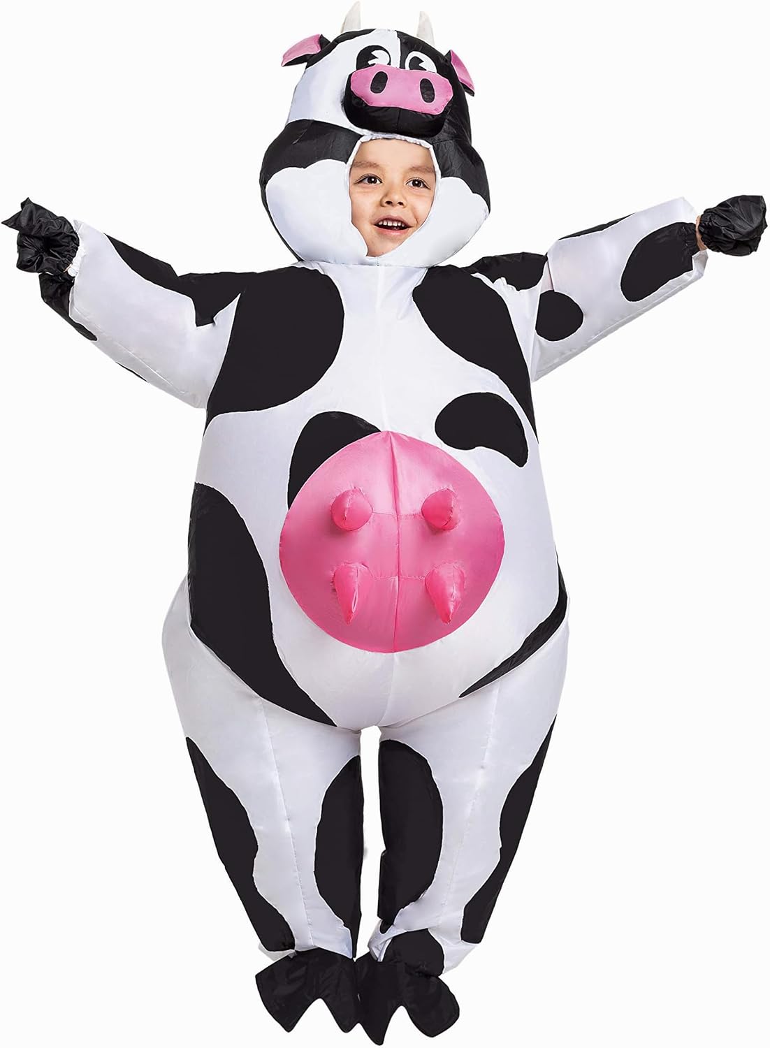 Child wearing a full-body inflatable cow costume for a farmyard family theme