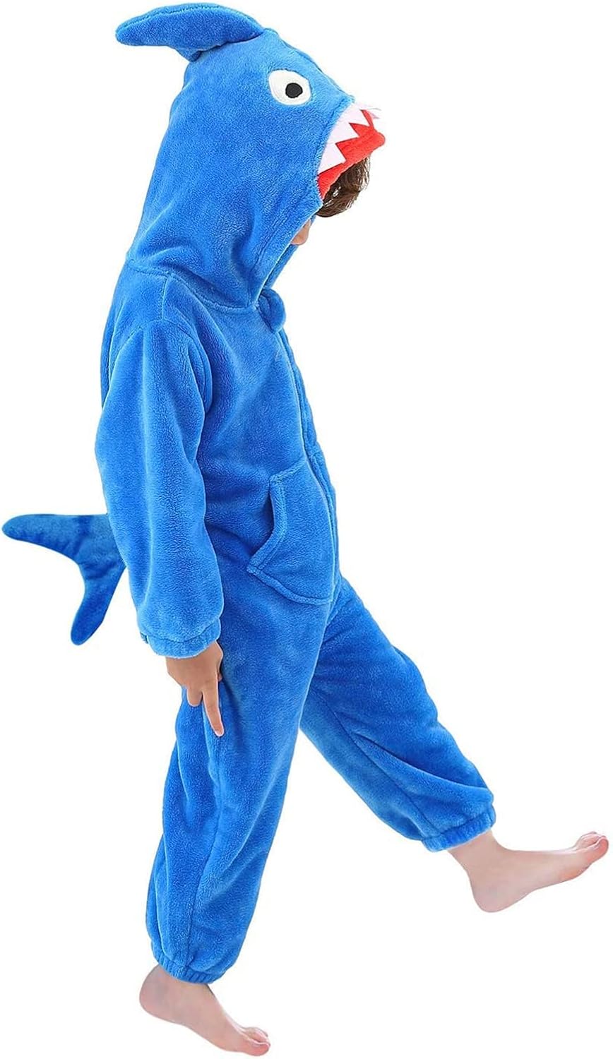 Child wearing a soft blue shark jumpsuit for an under-the-sea family theme